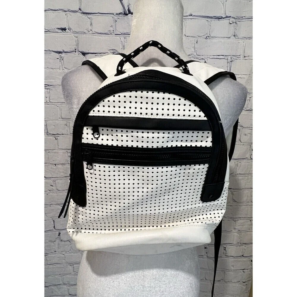 Merona white with black trim Faux leather backpack Lots of Pockets adjustable